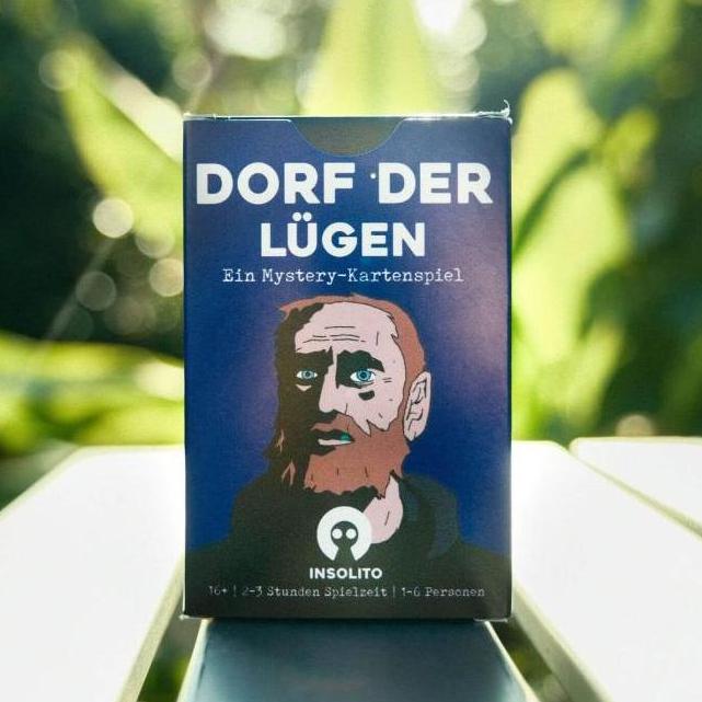 Die Schachtel von „Das Dorf der Lügen“